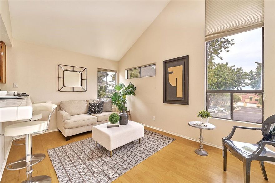 Beautiful townhome in the prestigious Las Brisas gated community, located in the highly sought after Walnut School District! This home offers an exceptional floor plan featuring two spacious master suites, including one conveniently located on the first floor, with the upstairs suite boasting high ceilings and a walk in closet. Enjoy multiple living areas including a formal living room, formal dining room, and a versatile family room/den, perfect as a home office or optional 3rd bedroom. Cozy fireplace in the living room adds warmth and charm. The attached two car garage has a spacious driveway. Step outside to a large private patio, ideal for BBQs and outdoor entertaining. The community also offers plenty of guest parking. Resort style amenities include a sparkling pool and spa. All this in a prime location near H Mart, shopping centers, and with easy access to the 57 and 60 freeways. The HOA fee paid by the landlord includes water and trash.
