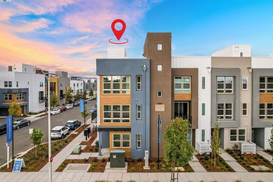 This stunning 2 bed, 2.5 bath, new construction townhome at the waterfront neighborhood of Island View by Landsea Homes, now a part of New Home Co., offers almost 1500 sq ft of contemporary living space with a 10-year builder warranty. This corner residence features an open-concept floor plan with space designed for entertaining, a sleek chef’s kitchen complete with quartz countertops, kitchen island, Samsung appliances, and ample storage. The primary suite upstairs includes a walk-in closet and a luxurious en-suite bathroom with dual vanities and a walk-in shower, while the secondary bedroom also features an en-suite bathroom. Additional highlights include a versatile 4th-floor loft with a wet bar and rooftop patio, a 2-car garage with an EV car charge outlet, solar installation, an energy-efficient water heater, and a balcony. With easy access to 880 & 580, downtown Alameda, South Shore Beach, Oakland, and San Francisco, this home is ideal for commuters and those seeking an exceptional lifestyle. Don’t miss this opportunity to own a legacy property in the up-and-coming area of Alameda Marina. This home is a part of the Alameda Marina $53M waterfront marina redevelopment and master plan.