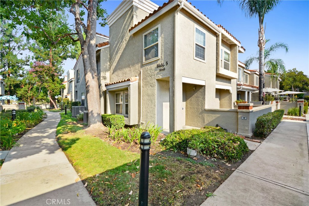 Discover this beautiful 2-bedroom, 3-bathroom corner townhome in the desirable Villa Paloma community. The bright and airy interior features recessed lighting, a cozy fireplace, and convenient first-floor laundry. This home includes a detached garage and an assigned parking space. Enjoy low HOA fees that cover water, trash, and access to a remodeled pool and spa. Centrally located near top schools, shopping at Victoria Gardens and Ontario Mills, restaurants, and major freeways. This FHA-approved home is a must-see and won't be on the market for long!