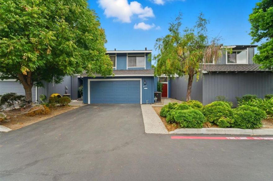 Spacious 2-story townhome in a desirable area of Santa Clara.  The home has been renovated to includes an updated kitchen, stainless steel appliances, new flooring, fresh paint, and updated bathrooms with a new shower and tub.  The home is highlighted by its natural features which include a vaulted wood beamed ceilings, central air conditioning, wood burning fireplace, and an oversized 2 car garage.  The large master suite includes a walk-in closet and balcony.  The home has also undergone a newer electrical panel, roof, and heater/air conditioner.  The relaxing low maintenance backyard includes a nice patio with grass and large cypress trees to provide privacy.    The home is close to restaurants, banks, and grocery stores along with Santa Clara's Central Park, Apple, kaiser, and other major tech companies.  The complex has a low hoa fee and is well maintained with newer exterior paint and a nice driveway but also has guest parking, a pool, a hot tub, and a private entrance to Homeridge Park.