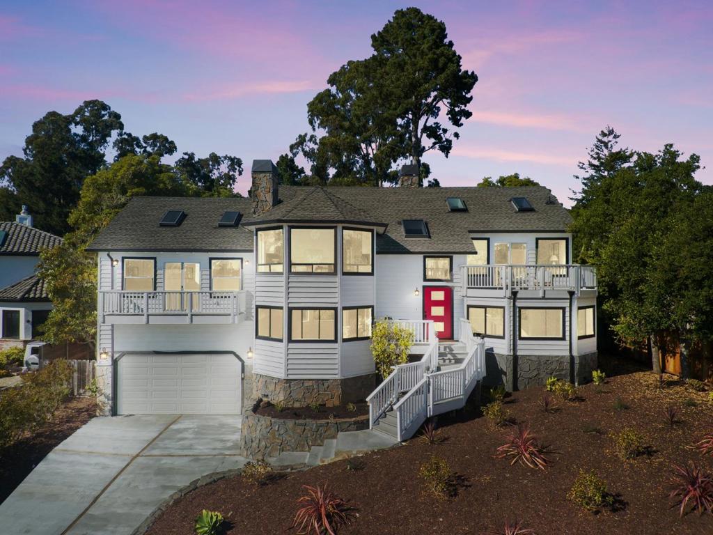 Contemporary Ocean & Golf Course View Home in Rio Del Mar. Located at the end of a private cul de sac, this contemporary home has views of the Pacific Ocean & Seascape Golf Course. The heart of the home is a soaring great room featuring a floor-to-ceiling rock fireplace that elegantly divides the spacious living & dining areas, creating both openness & definition. Walls of glass & high ceilings flood the space w/natural light, A beautifully appointed kitchen has elegant marble countertops, stylish tiled backsplash, & gas stove. A built-in beverage bar & dumbwaiter adds a touch of convenience. The generous layout includes four bedrooms, offering flexibility for guests, a home office, or multi-generational living. The primary suite is a serene retreat with floor to ceiling mirrored walls, a marble tiled gas fireplace, TV center, walk in closet & sliding glass doors w/its own private view balcony. The spa-like bathroom includes a walk-in tiled shower, separate soaking tub, & a custom tiled vanity w/dual sinks. The secluded backyard w/a hot tub, outdoor shower, sauna, fire pit & spacious patio. Perfectly situated in the desirable Rio Del Mar neighborhood, this one-of-a-kind home combines architectural impact w/peaceful surroundings just minutes from beaches, golf, & local amenities.