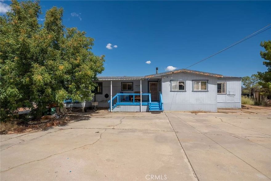 This spacious 2 bedroom, 2 bathroom manufactured home (1,344 sq.ft.) sits on 10 private acres, offering peace, privacy, and endless possibilities.

Features include:

 • Detached garage for parking and storage

 • Private horse stable – ideal for equestrian lovers

 • Private water well – enjoy freedom with no water bills

 • Fully fenced yard with electric gate – secure and private

 • Expansive open land – perfect for farming, livestock, or your dream ranch

 • Beautiful mountain views – enjoy nature right from your home

 Location highlights:

The property is located in a small town that has everything you need – schools, post office, restaurants, supermarket, and even a casino resort hotel. Enjoy the best of both worlds: peaceful country living with modern conveniences just minutes away.

Don’t miss this rare opportunity to own your own piece of paradise!

Homes is selling AS IS, NO INSPECTIONS, NO REPAIRS OR WARRANTIES
