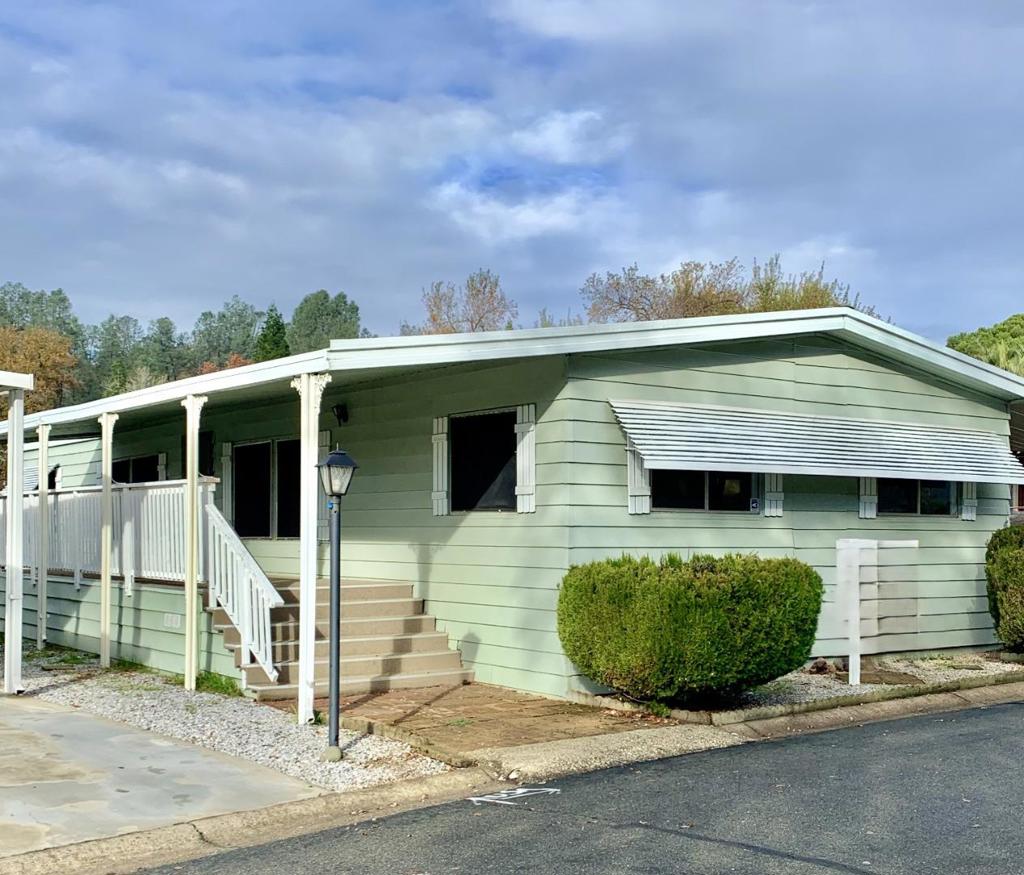 Check out this 1977 home in the community of Twin Lakes Estates. It is approx. 1,440 sqft with 3 bedrooms and 2 bathrooms. Low Space Rent. The Kitchen features a refrigerator, oven and cabinets. Both bedrooms have carpet while one of the bedrooms has a mirrored closet. Home has windows for direct sunlight. Backyard had 1 shed. You'll love the pond, nature trails and home is close to the lake!