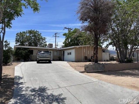 Photo of 57005 Antelope Trl, Yucca Valley, CA 92284 (MLS # FR26106309)