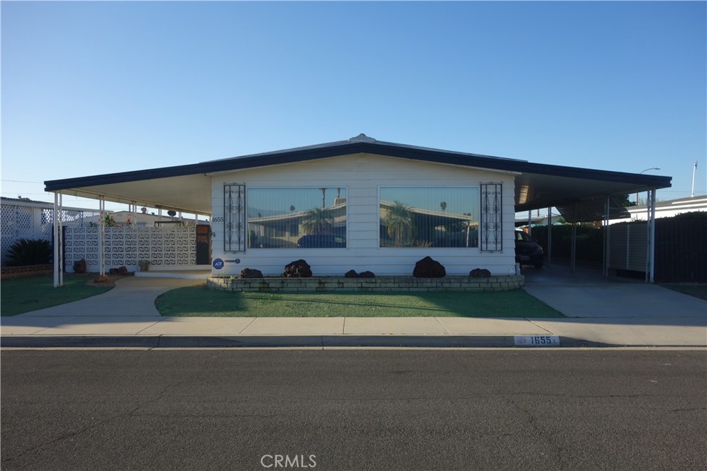 Welcome home to this nicely maintained 2 bedroom 2 bath home located in Sierra Dawn Estates, a 55+ Community where you own the land. This 2 bedroom 2 bath home features an open spacious living room, formal dining area with a built in hutch with plenty of storage. The kitchen features gas cooktop, dishwasher refrigerator and a cozy nook area. Right off the kitchen is the laundry with storage. The kitchen flows nicely into the oversized family room with a sliding glass door leading out to the good size covered patio. Down the hall you will find the guest bedroom with the guest bath right across the hall. The primary bedroom is a good size with 2 separate closets and a vanity just before the primary bathroom. Outside features a low maintenance yard with rose bushes, a fenced in yard for your furry pet and a covered patio. Sierra Dawn Estates features 4 clubhouses, 5 pools, jacuzzi sauna, Billiards, shuffleboard horseshoe and many more fun activities and clubs to join in on the fun! Put this one on your list to see today!