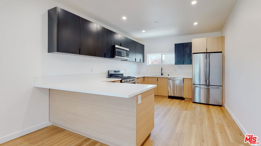 **1ST MONTH FREE PROMO - READ FULL DESCRIPTION ** PRIVATE BACK YARD ** PRIVATE GARAGE ** LARGE BALCONIES ** 2 ASSIGNED PARKING ** PET FRIENDLY ** Welcome to 2331 Hauser Blvd, a stunning collection of modern townhome-style apartments that perfectly blend luxury, comfort, and the feeling of home. These spacious 4-bedroom, 3-bath residences are thoughtfully designed with today's lifestyle in mind, offering the rare combination of contemporary finishes and private outdoor spaces, including personal balconies and your very own backyard oasis. Inside, the open-concept floor plans create a seamless flow between living, dining, and kitchen areas, filled with natural light from large windows. Each bedroom is en-suite, complete with its own bathroom and closet, ensuring privacy and convenience for every resident. No detail has been overlooked: enjoy a built-in washer and dryer, central air and heat, stainless steel appliances, custom cabinetry, and designer fixtures throughout. Private on-site parking and garages provide both security and ease. Beyond your front door, you'll find yourself in the heart of West Adams, one of Los Angeles' most exciting and culturally rich neighborhoods. This vibrant community has quickly become a hub for creatives, professionals, and families alike, offering a dynamic mix of beloved local dining, coffee shops, and nightlife alongside an ever-growing art and cultural scene. Just minutes from Culver City, Mid-City, and major freeways, the location provides effortless access to all of Los Angeles while maintaining a neighborhood charm that feels distinctly its own. Whether you're enjoying your private backyard, entertaining on your balcony, or exploring the neighborhood's buzzing food and art scene, life at Hauser Townhomes offers an elevated rental experience tailored to modern living. These homes lease fastdon't miss your chance to call this one-of-a-kind community home! Pictures may vary of similar units - tenant pays utilities ** 1ST MONTH FREE PROMO - PRICE SHOWN WITH 12 MONTH BUDGET SPREAD - RENT IS $4,595 **
