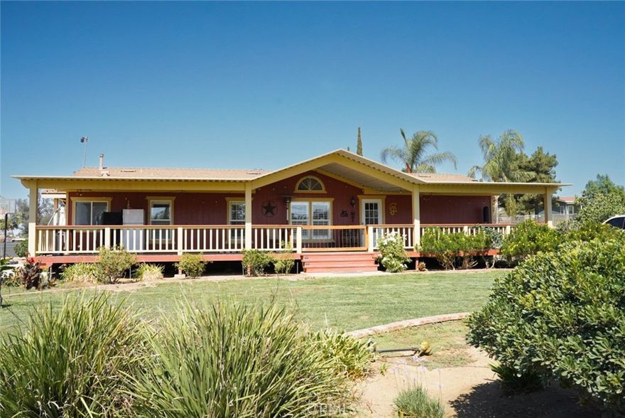 Welcome to this beautiful freshly remodeled ranch-style home in Mead Valley, nested on over 2 acres of flat usable land, perfectly combining modern upgrades with classis county charm.  Immaculately kept and truly move-in ready, this home offers 3 bedrooms, office room that can easily be used as 4th bedroom and 2 full baths, living room spaces filled with natural light, open inviting layout, and highly-quality finishes throughout.  Spacious private front porch with a view of the entire property, perfect to enjoy your evenings with family and friends.  Set on a spacious lot ideal for horses and outdoor living, plenty of truck parking space with entrance access from rear and front property.  Property features, electric front gate (main entrance), chainwheel rear gate, 6 cover horse stalls, a saddle storage, wash stall, round pen, 16 horse corrals and a cover patio with a private work shed AC unit.  A TRULY ONE-OF-A-KIND PROPERTY!!!