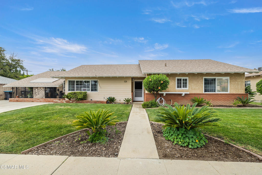 This stunning Tom Paul home is loaded with features. The 10,018 sq. ft. lot has 3 avocado, 1 orange, 1 lemon, and 1 tangerine tree. The back yard features a rolling wrought iron gate which gives access to two large out buildings with covered parking for at least three cars and is fully paved with concrete. The upper level is separately fenced and gated with a manicured lawn with automatic sprinklers. It also features a relaxing spa for those cool Simi Valley evenings. The home itself has a huge 25 X 17 living room with plenty of windows making it light and bright. The expansive family room with wood and gas burning fireplace has a great view of the back yard . The kitchen is very spacious with loads of cabinets, granite, and a garden window with a view. There also several ceiling fans, tons of linen storage, recessed lighting everywhere and of course central air and heat. Another great feature is the added laundry room with up graded electrical panel and again lots of added storage. The washer/ dryer/ and refrigerator are also included. This is a VIEW property
