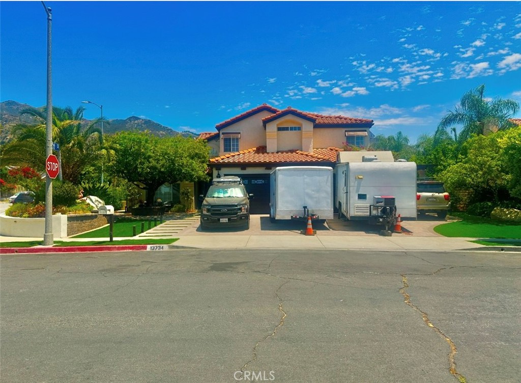 Welcome! To this Spacious 5 Bedrooms and 3 baths home in the city of Sylmar. Home features; a welcoming clean and well maintained landscaping thought-out the house. 3 car garage with storages and RV access. The back yard is full of surprises, with a sparkling Pool and Spa, cover patio, gazebo, fruits trees, lots of space for relaxation for this hot summer. The interior features, 5 Bedrooms and 3 bathrooms. The gorgeous primary bedroom, offer a large walk-in closet, dual sinks, shower, Jacuzzi with a welcoming balcony with a mountain view and privacy. A cozy informal living room along with a formal living room with a fireplace for hosting guest during special occasions. Beautiful kitchen with granite counter-tops, lots of cabinets storages with stainless steel appliances. Nearby- freeways, schools, parks, restaurants and much more. This is a must see property to appreciate all the unique craftsmanship.