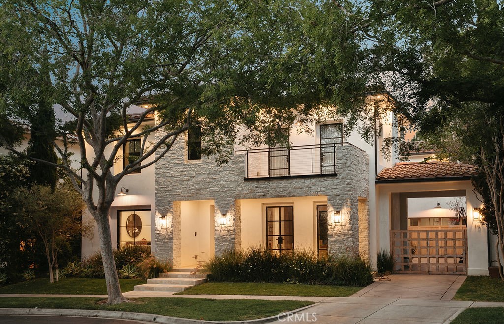 Welcome to 10 Seabluff, an exquisitely remodeled 5-bedroom, 5.5-bathroom home nestled in a private, gated enclave of Newport Beach. Located on a quiet cul-de-sac lined with mature trees, this family-oriented community is alive with children playing and neighbors connecting. Enjoy the perfect blend of luxury, comfort, and convenience just minutes from world-class shopping, top-rated schools, and some of Orange County’s best restaurants.
Fully reimagined in 2020 with a down-to-the-studs remodel, this 5,781 sq ft home sits on a 10,659 sq ft lot and boasts an open floor plan with designer finishes throughout. The chef’s kitchen is a culinary dream featuring premium appliances, sleek cabinetry, and a spacious island perfect for entertaining. Smart home features powered by Control4 technology include a built-in movie room, surround sound, smart lighting, and a full security system.
The entertainer’s backyard is a true retreat, complete with a sparkling pool, outdoor BBQ, and fire pit. One of the original garage bays has been thoughtfully converted into a stylish bonus room with direct pool access—ideal for guests or a pool cabana. Upstairs, the expansive primary suite features a spa-inspired bathroom and a massive walk-in closet.
Additional highlights include a dual-zoned HVAC system, inside laundry room, and upstairs laundry for added convenience. With all-new electrical, plumbing, windows, and drywall, this turnkey property offers peace of mind and modern elegance.
Don’t miss the opportunity to live in one of Newport Beach’s most desirable neighborhoods—where luxury meets lifestyle.