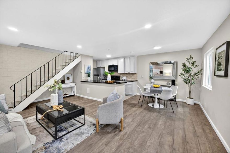 Welcome home to this beautifully refreshed 2-bedroom, 1-bath condo located in the highly desirable Hamilton Downs community within walking distance to Downtown Campbell. With modern updates, warm finishes, and an unbeatable location, this home blends comfort, style, and convenience. The open-concept living space showcases a kitchen with crisp light shaker cabinets, sleek black countertops, and upgraded appliances including brand new in-unit washer and dryer. Luxury vinyl flooring flows seamlessly throughout the living, dining, and kitchen areas, where large windows fill the space with natural light. Refreshed lighting adds a sophisticated touch in both the living area and bedrooms. Upstairs you'll find two bedrooms with generous windows, a full bath, and a washer and dryer for everyday convenience. Additional features include a dedicated carport with built-in storage cabinets. Just steps from Downtown Campbell, enjoy easy access to vibrant restaurants, coffee shops, wine bars, local boutiques, The Pruneyard, and the beloved Sunday farmers market. With close proximity to highways 17, 280, 880, and 85, commuting to leading tech employers such as Apple, Nvidia, and Adobe is effortless. Don't miss this opportunity to own in one of Campbells most walkable and connected neighborhoods.