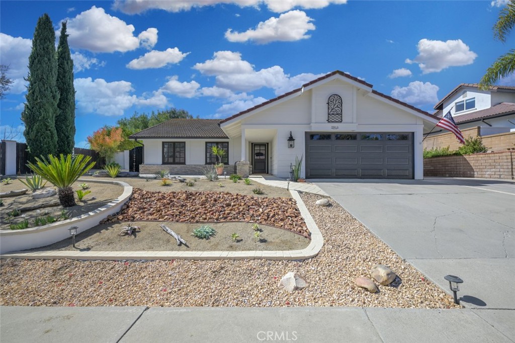 Come home to this fantastic San Clemente spread in the sought after neighborhood of Rimrock, located in in Forester Ranch. This home has been expanded to 2,134 sq ft! An enormous Bonus/Family room was added- (23 x 23) for entertaining with a beautiful fireplace, hardwood flooring and French doors looking out to the expansive covered patio comforting the serine back yard. The original Primary bedroom was turned into the huge master bath with a spacious shower and lovely double sink, extra cabinetry and another sink and cabinet for the perfect spacious morning coffee station and more. Primary bath also has dressing area with plenty of closet room now! A very private Primary bedroom was then added with hardwood flooring & even more French doors- two sets, leading to the covered patio, with ceiling fan and spiral staircase to the rooftop deck with freestanding fireplace and peek ocean view and great beautiful hills views! RV access is 14 x 23, not including the driveway area- plenty of parking for everyone! The large Bonus room and patio have been wired for surround sound for entertaining and beach vibe parties to come. The kitchen is light and bright with white cabinetry and light quartz countertops and beautiful stainless steel appliances, with a spacious dining area with French doors just off of it. 
It is very unusual to come across a home of this size in Rimrock, AND it is on a cul-de-sac! The roof has 7 solar panels that have been paid for, not leased, nothing to do now but save!  In back yard, left side also has a standing peek ocean view.  Plenty of shopping, grocery stores, Trader Joes, a large choice of restaurants, fitness gym, medical offices, & more are just down the main street when leaving the neighborhood- just a few minutes away!  Drive to the beach in 10 minutes or shop the San Clemente Outlet Mall. Get to the famous San Clemente Pier in aprox a short 15 minute drive. Beach living at you fingertips!