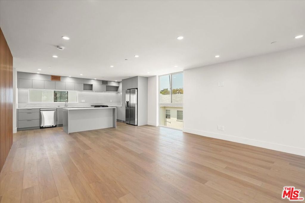 ** 1ST MONTH FREE PROMOTION - SEE FULL DESCRIPTION BELOW ** PET FRIENDLY ** WASHER/DRYER ** CENTRAL A/C ** 2 ASSIGNED PARKING ** BALCONIES ** PRIVATE ROOFTOP DECK ** Experience the ultimate in modern Los Angeles living at 1752 N Van Ness Ave, nestled in the vibrant heart of Hollywood. This stunning, pet-friendly residence is the perfect blend of style, comfort, and city convenience. Step into a beautifully designed unit featuring soaring ceilings, a spacious open layout, and a chef-inspired kitchen complete with a large center island, designer cabinetry, and top-tier stainless steel appliances perfect for entertaining or quiet nights in. Each bedroom is a sanctuary, featuring en-suite bathrooms and ample closet space, while private balconies bring in natural light and create an airy indoor-outdoor flow. Unwind on your private rooftop deck with panoramic city and Hollywood Hills views, your oasis above the city. Enjoy the convenience of central air conditioning, in-unit washer and dryer, and two assigned parking spaces. Located moments from Hollywood's most iconic attractions, you're surrounded by trendy cafes, bars, the Hollywood Walk of Fame, Netflix and Paramount Studios, and world-class dining and entertainment. Whether you're catching a show at the Pantages Theatre, hiking nearby Runyon Canyon, or grabbing brunch in Franklin Village, everything you love about LA is just minutes away. This is more than just a home, it's a lifestyle. Don't miss your chance to live in one of Hollywood's most desirable and connected neighborhoods. ** 1ST MONTH FREE PROMOTION - PRICE SHOWN WITH 12 MONTH BUDGET SPREAD - BASE RENT $5,450 ** VARIOUS FLOORPLANS AVAILABLE.