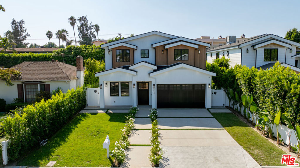 This 2024 custom Cape Cod is more than a home, it's a showcase of impeccable design and craftsmanship in the sought-after Sherman Oaks flats. Every inch has been thoughtfully curated, with no detail overlooked, blending timeless elegance with modern sophistication. Inside, stunning herringbone hardwood floors set the tone for refined living, flowing seamlessly through spacious, light-filled interiors. The open-concept kitchen and family room are the heart of the home, designed for both comfort and style. A chef's dream, the kitchen features top-of-the-line Thermador appliances, a pot filler, and a Butler's walk-in pantry . The seamless indoor-outdoor connection leads to a beautiful, private backyard, an expansive retreat with a sparkling pool, spa, and generous grassy area, perfect for gatherings or quiet relaxation. With 5 bedrooms and 6 bathrooms, the home offers exceptional space and privacy. The primary suite is a true sanctuary, complete with soaring ceilings, a massive walk-in closet, a makeup vanity, designer lighting, and a spa-like bathroom featuring a freestanding soaking tub. Beyond the home itself, the location is simply unbeatable. It is just a short stroll to Equinox, Erewhon, and some of the best shopping, dining, and entertainment Sherman Oaks has to offer. A rare opportunity to lease a residence of this caliber in the heart of the Valley. Available for long-term lease only (13 months+).