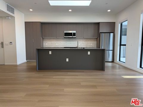 Photo of 5119 Colfax Avenue #301, Valley Village, CA 91601 (MLS # 26712873)