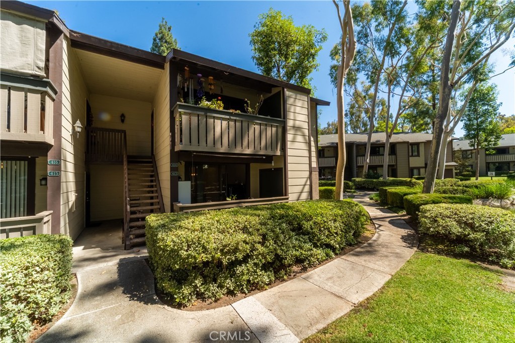 This lower-level condo offers a cozy 560 square feet of living space, featuring 1 bedroom and 1 bathroom. Enjoy views of gorgeous, mature pine trees, tranquil streams, peaceful ponds, and a large, refreshing pool—all just a short walk from the newly converted pickleball courts.The kitchen features a newer stainless steel refrigerator, granite countertops, and tile flooring. A full-size washer and dryer are included and conveniently located in the patio laundry closet.This unit also includes a one-car garage plus an additional parking permit. The HOA covers water, trash, and exterior maintenance.Perfectly located near shopping centers, major freeways, parks, hiking and biking trails, Saddleback Church, Irvine Spectrum, and LA Fitness.