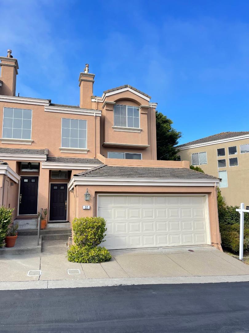 Located in the exquisite, private Terrabay Community, this freshly renovated townhouse offers a peaceful home facing the San Bruno Mountains. The home floods with natural lighting, view of the bay, and a large balcony. This 2-bedroom home offers full bathrooms in each bedroom with a half bathroom in the living room. The home provides some new appliances, upgraded bathrooms, premium hardwood flooring, and designer motorized shades. The home features a fenced- backyard with a large deck, 2-car garage, and a decently sized storage room with premade sturdy shelves. Extra freezer in the garage. The home has spacious closets and cabinets. Spacious backyard has a large deck that was recently stained and provides a great environment for outdoor gatherings and relaxation. Large balcony that provides view of the bay and surrounding areas. Conveniently located with easy access to Highway 101, 280, nearby shopping/dining, Costco, and within 15 minutes of San Francisco.