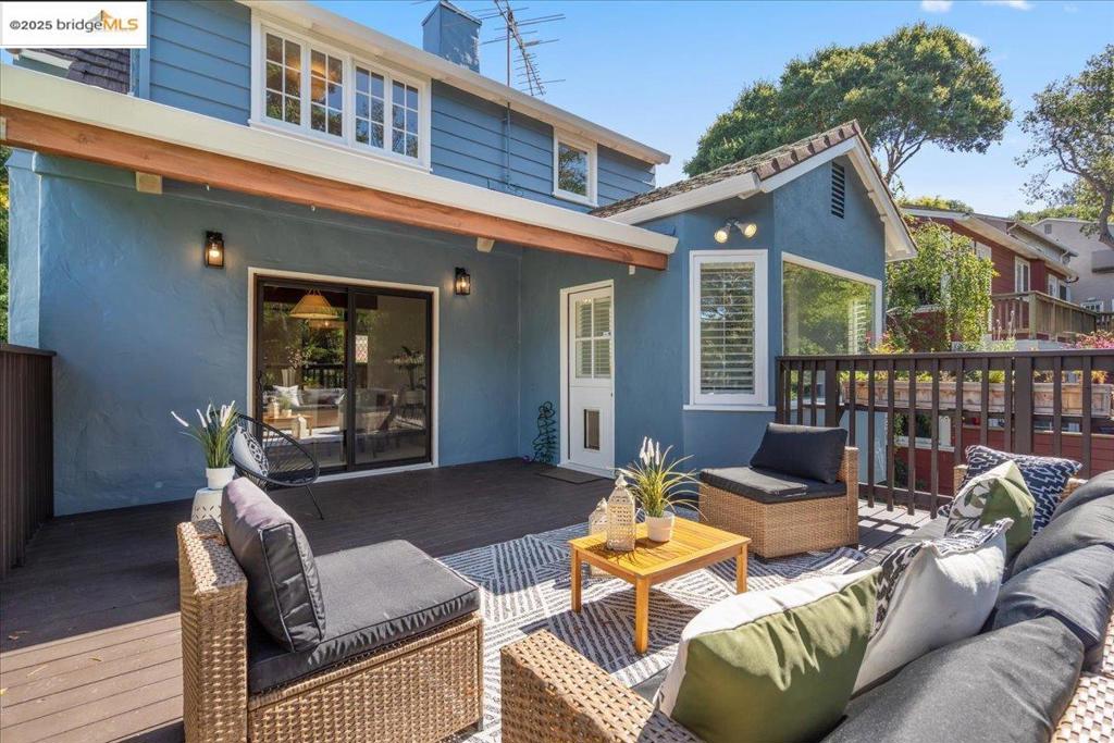 Nestled in coveted Upper Rockridge, this thoughtfully updated home blends timeless charm with modern convenience. A full seismic retrofit (2020) with new foundation and structural reinforcements provides peace of mind, while extensive upgrades make it move-in ready. The bright, stylish kitchen features quartz countertops, a cast-iron sink, cabinet lighting, Restoration Hardware finishes, updated appliances including a Carrier furnace, KitchenAid dishwasher, and LG washer, plus a charming breakfast nook overlooking the backyard. Indoor-outdoor living shines here: new sliding glass doors open to a large, private deck freshly stained in 2025 — ideal for entertaining or enjoying dinner al fresco. The landscaped backyard and front yard include fruit trees, a flagstone patio, and a retaining wall. Bathrooms have been refreshed with new fixtures, lighting, and finishes, while the downstairs office/bonus space boasts all-new windows and doors. Additional highlights include refinished hardwood floors on the upper level, fresh exterior paint (2023), a garage with interior access featuring a new door and concrete floor, updated electrical work with stylish hardware, and a fireplace restored to excellent working condition. This inviting home is just moments from Hillcrest School, Village M