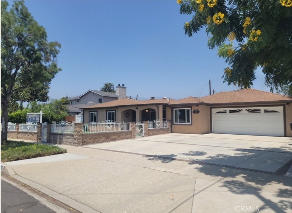 Welcome to 433 E Mason St – A Rare, Spacious Single-Story Gem in Azusa!
This beautifully updated 3-bedroom, 2-bath home offers a unique opportunity to own a single-story residence with over 2,200 sq ft of living space—a rare find in this desirable neighborhood. Situated on a generous 7,247 sq ft lot, this home is perfect for growing families, multigenerational living, or anyone who values space, convenience, and thoughtful design. This property can function as a two with its own private entrance to the family room with its own bathroom and kitchenette!
Step inside to discover a flexible floor plan that includes a massive family room with its own private entrance and built-in king-size Murphy bed—ideal for guests, a rental unit, or an in-law suite. The oversized hallway-turned-library, added in 2020, brings character and charm, while the expansive laundry and kitchenette area offers practical convenience rarely found in homes of this kind. Professional pics coming soon.
One of the standout features is the exceptional oversized bathroom equipped with three sinks, a handicap-accessible features, and even a diaper changing station—perfect for caregiving needs or future planning.
Additional highlights include:
Private front patio with beautiful custom metal fencing
Kitchen has matching oven (that has air fryer and convention functions), microwave and dishwasher.
New covered backyard patio for relaxing or entertaining
2-car garage and driveway parking for up to 6 more vehicles
Located in a quiet, well-kept neighborhood
Just minutes from Downtown Azusa, APU, Citrus College, shopping, dining, freeways, and local parks
This home checks all the boxes—size, location, versatility, and comfort. Don’t miss your chance to own this one-of-a-kind property listed at $845,000. Schedule your private tour today!