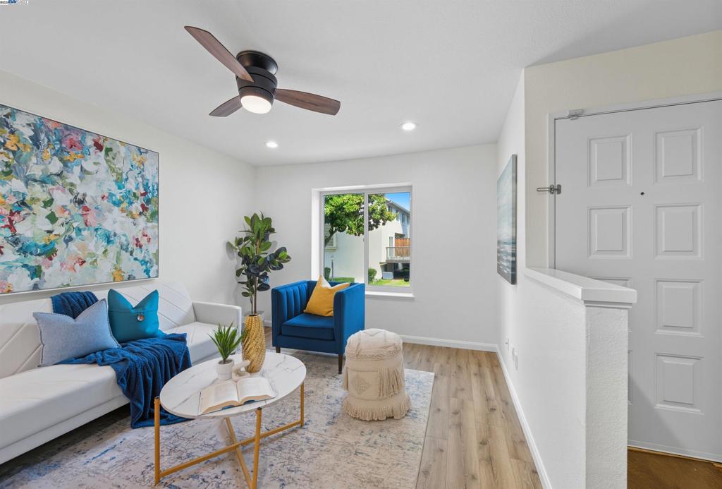 MOVE-IN READY townhome in Fremont’s highly sought-after Irvington neighborhood! Walking distance to TOP-RATED SCHOOLS and offering easy commute access to Silicon Valley, this UPDATED home features a modern open floor plan with a KITCHEN REMODELED in 2022 showcasing quartz countertops, stainless steel appliances, and CONTEMPORARY white cabinetry. Enjoy the light-filled living and dining areas that flow seamlessly to a newly refreshed low-maintenance OUTDOOR DECK, perfect for relaxing or entertaining. Upstairs, find SPACIOUS BEDROOMS including a comfortable primary suite with ample closet space. Two other bedrooms shared an UPDATED BATHROOM in the hallway. WOODEN FLOOR throughout the property for ease of maintenance. A versatile BONUS room on the garage level provides the ideal setup for a 4TH bedroom, kids’ playroom, private home office, or fitness studio. Conveniently located near BART, Lake Elizabeth, Pacific Commons, I-880 & I-680 freeways, and major Silicon Valley TECH CAMPUSES, this home is designed for today’s lifestyle with flexibility and comfort in mind.