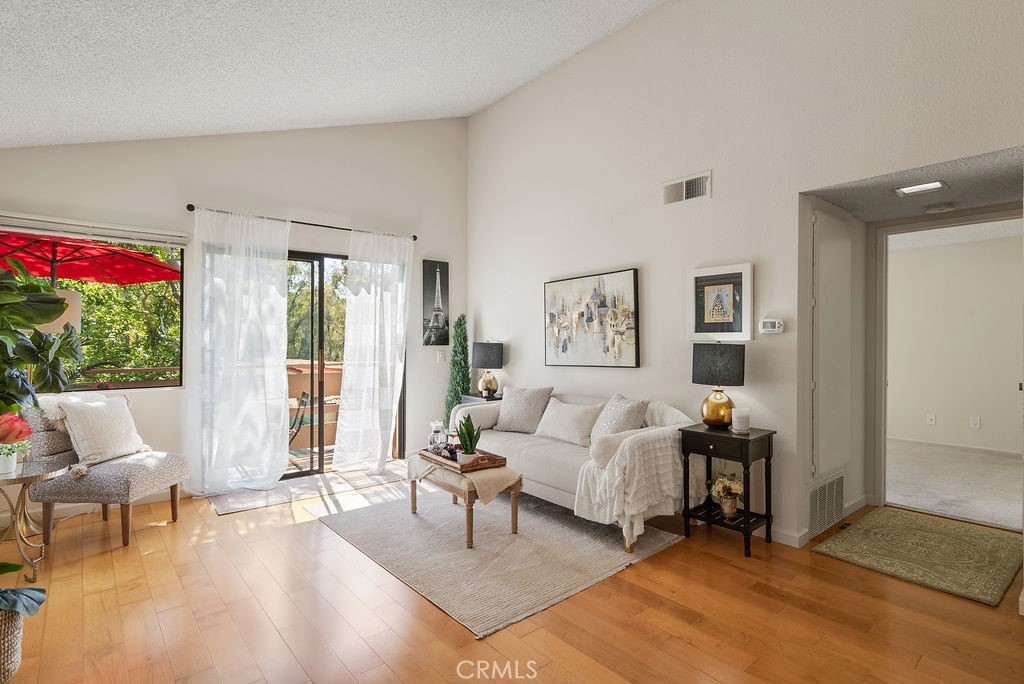 Welcome to your wonderful move-in ready upstairs condo, perfectly situated just steps from the pool in a guard-gated community with 24/7 security.
This bright and airy one-bedroom, one-bath home features vaulted ceilings in the living and dining rooms, enhancing the natural light that pours in throughout the day. Enjoy peaceful mornings or relaxing evenings on your private balcony, surrounded by mature forest-like trees for a serene retreat. The home includes an in-unit laundry room, a newer HVAC, brand new water heater and comes with two dedicated carport spaces conveniently located near the unit. The community offers resort-style amenities including multiple pools, tennis courts, and a charming clubhouse with billiards and complete with a full kitchen, game tables and a cozy fireplace—perfect for entertaining or unwinding with neighbors. You’ll love the prime location of beautiful Diamond bar—just minutes from major freeways, Cal Poly Pomona, Mt. SAC College, golf courses, hiking trails, parks, and a variety of shopping, dining, grocery, and coffee options.
Don’t miss the opportunity to own this charming condo in a Resort-Style Community.