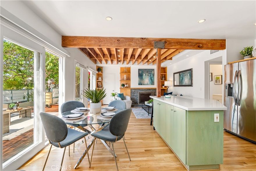 Experience the best of Venice living in this light-filled, updated single-family home offering 4 bedrooms, a dedicated office, and 3 bathrooms across approximately 2,100 square feet of living space. With a blend of modern updates and coastal charm, this home features gorgeous wood flooring, brand new carpet, and an open layout designed for comfort and style. Level one features an open concept with a formal living area, kitchen, dining area, one small bedroom, bathroom, and a TV/family room. On the second floor, you will find two spacious bedrooms, a full bathroom, a built-in storage closet, and an office with abundant shelving and a private balcony. Also on floor two is the primary bedroom offering a fireplace, en-suite custom updated bathroom, and Juliet balcony. Step outside to a large private deck perfect for entertaining or relaxing in the private jacuzzi. The home also features in-unit laundry, private 1-car parking, and ample indoor-outdoor flow. Situated just moments from Abbot Kinney’s vibrant shops and restaurants, the iconic walk streets, and the eclectic energy of Venice Beach, this home offers the ideal mix of convenience and character. Whether you're working from home in the dedicated office or enjoying all the local hotspots, this is Venice living at its best!