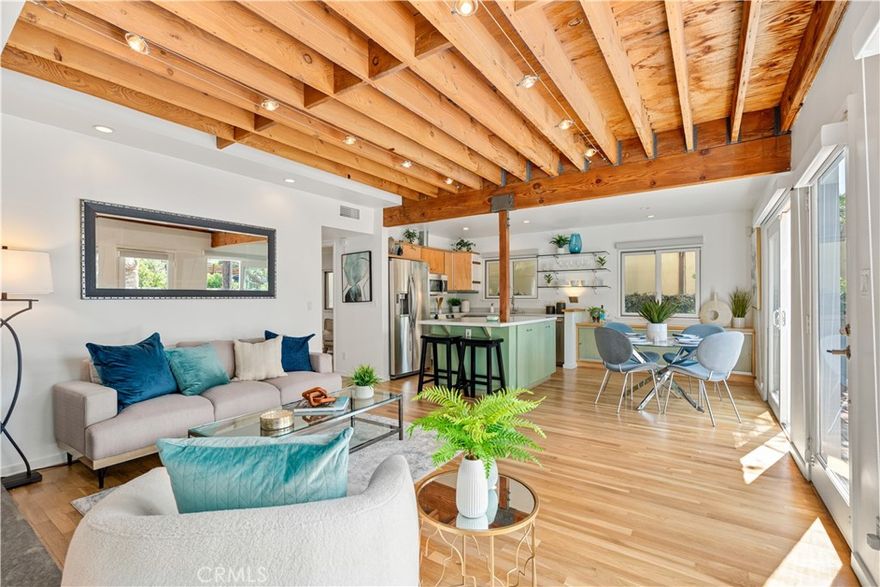 Experience the best of Venice living in this light-filled, updated single-family home offering 4 bedrooms, a dedicated office, and 3 bathrooms across approximately 2,100 square feet of living space. With a blend of modern updates and coastal charm, this home features gorgeous wood flooring, brand new carpet, and an open layout designed for comfort and style. Level one features an open concept with a formal living area, kitchen, dining area, one small bedroom, bathroom, and a TV/family room. On the second floor, you will find two spacious bedrooms, a full bathroom, a built-in storage closet, and an office with abundant shelving and a private balcony. Also on floor two is the primary bedroom offering a fireplace, en-suite custom updated bathroom, and Juliet balcony. Step outside to a large private deck perfect for entertaining or relaxing in the private jacuzzi. The home also features in-unit laundry, private 1-car parking, and ample indoor-outdoor flow. Situated just moments from Abbot Kinney’s vibrant shops and restaurants, the iconic walk streets, and the eclectic energy of Venice Beach, this home offers the ideal mix of convenience and character. Whether you're working from home in the dedicated office or enjoying all the local hotspots, this is Venice living at its best!