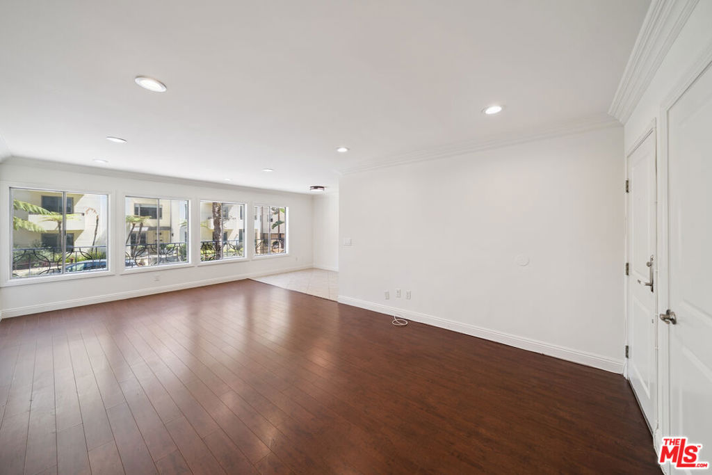Beverly Hills, Controlled Access, Remodeled Unit, front unit, Central A/C, New Appliances, Granite Kitchen, Pergowood floors, Closets, Pool, 1 parking spot, In Unit Laundry hookups (Furthermore, the unit is equipped with a stacked washer and dryer that are currently out of operation. Tenants may choose to repair or retain the appliance at their discretion. Should they opt not to do so, arrangements will be made to remove it accordingly.) tenant will need to provide their own refrigerator. Welcome to your oasis in prime Beverly Hills! This bright and spacious 2-bedroom, 2-bathroom unit offers an abundance of natural light streaming through large windows, beautifully complemented by updated flooring and recessed lighting throughout. Step into the stylish kitchen featuring modern wood cabinetry and sleek quartz countertops. Mater bedroom offers an en suite bathroom, providing the perfect blend of comfort and privacy. You'll also enjoy plenty of storage space throughout the unit. Located in a secure, gated building with gated parking, this well-maintained property includes on-site laundry facilities, professional on-site management, and a refreshing poolideal for relaxing and entertaining. Don't miss this rare opportunity to live in one of L.A.'s most sought-after neighborhoods!