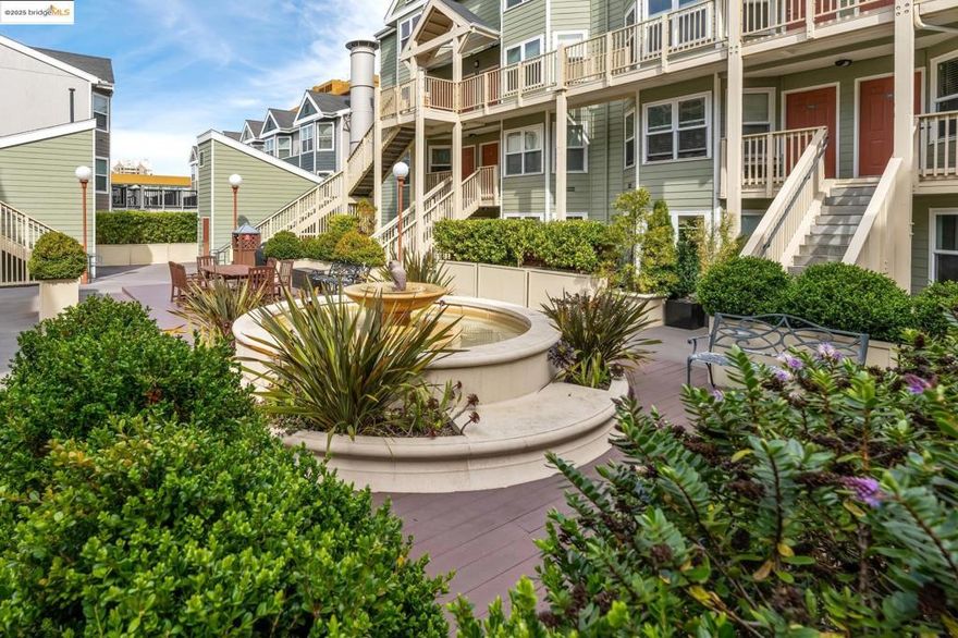 Rarely available modern condo with a versatile den/flex space, located directly across from San Francisco’s iconic Painted Ladies at Alamo Square Park on the border of Hayes Valley. This home combines the charm of a historic neighborhood with the convenience of a newer building in a secure, gated community. The unit offers no steps to entry, wide-plank hardwood floors, an upgraded kitchen with granite counters, in-unit washer/dryer, and a bright living/dining area. The flexible den works perfectly as a home office, lounge, or guest stay. The generously sized bedroom includes a floor-to-ceiling closet and opens directly to a private patio. One dedicated garage space is included—ideally located next to the elevator that takes you straight to the condo level. Community amenities feature a lush courtyard with a fountain and BBQ area, secured mailboxes, and a parcel room. With a Walk Score of 96 (Walker’s Paradise), plus Excellent Transit and Very Bikeable ratings, enjoy unmatched access to Hayes Valley dining, shops, cafes, and public transportation. Multiple Muni lines within one block provide a 20-minute commute to the Financial District, with nearby BART stations offering citywide and Bay Area connections. Exceptional condo with private patio and parking in the heart of SF!