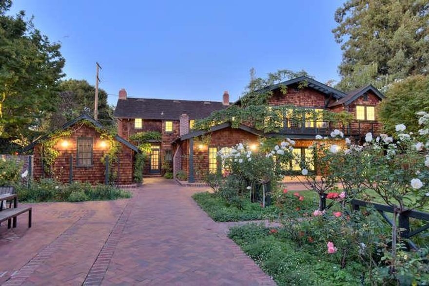 Ideally situated in the heart of sought after Old Palo Alto,this rarely available Craftsman w/breathtaking gardens combines modern living  preserving its 1915 heritage. Arts & Crafts details display wainscot paneling, layers of crown moldings, + extensive built-ins.The 2nd floor offers 5 bdrms,  all with timeless appeal in a bright &l light ambiance. Spacious formal rooms open to inviting spaces for casual living w/both the living room & sunroom opening to the lush rear grounds for quintessential California indoor/outdoor entertaining.The English gardens are meticulously designed by Jack Stafford & Katsy Swan, with lush lawn, drapes of wisteria, roses, fruit trees, brick terraces & an outdoor fireplace sitting area.A tucked-away pool &  pool house offer total  privacy on the rear grounds.With its coveted location plus its close proximity to University Ave,Town &  Country Shopping, Stanford University, & top rated Palo Alto schools, this is a rarely available Silicon Valley offering.