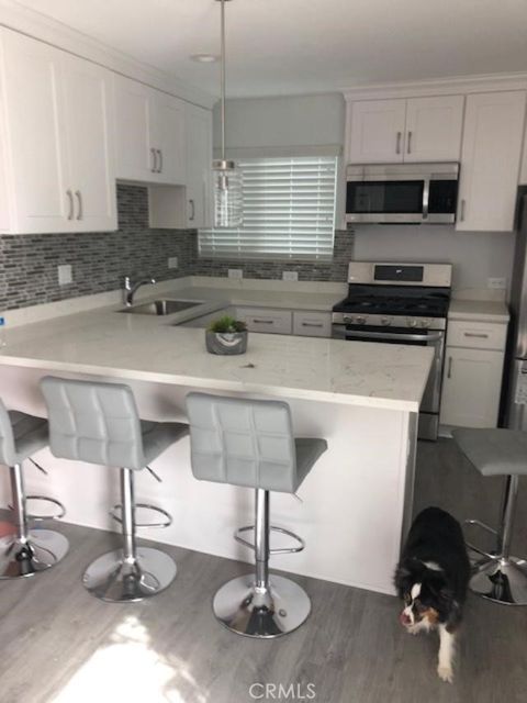 Photo of 114 E Balboa Blvd #A, Newport Beach, CA 92661 (MLS # NP26069623)