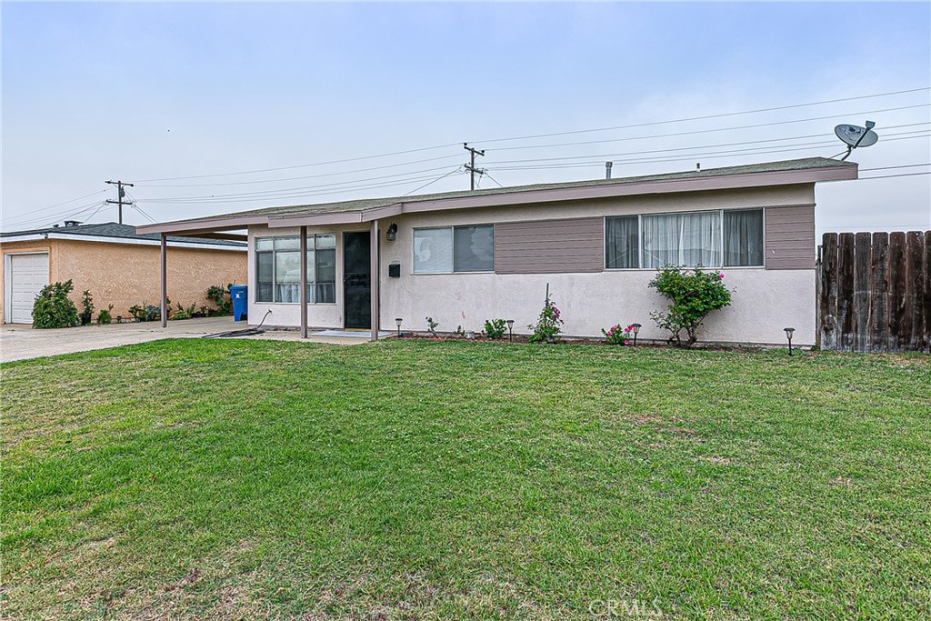 This adorable home is full of fresh updates and ready for new owners! Recently painted with new flooring throughout, it offers a clean and inviting space that feels like home the moment you walk in. Enjoy the natural light with new blinds and curtains, adding both comfort and style. You'll love the spacious laundry room for extra convenience and the carport for covered parking. The nice-sized yard is perfect for gardening, entertaining, or simply relaxing outdoors. Don't miss this cute and affordable gem—it won't last long!