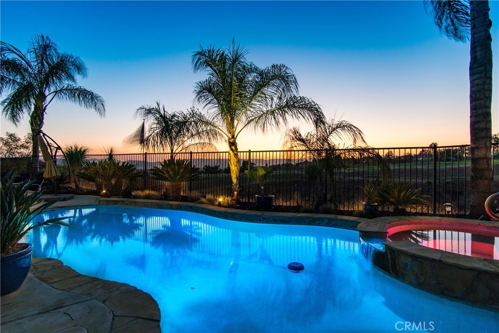 A PICTURE IS WORTH A THOUSAND WORDS.........SINGLE LEVEL POOL HOME WITH VIEW ON CANYON ACROSS FROM DRIVING RANGE.
