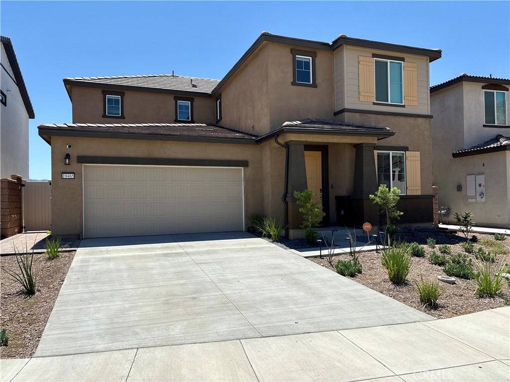 You got to see this one!! One exit past corona off 15 frwy on the east side in a brand new community. Turnkey home with $50,000 of upgrades in backyard! Step into your private backyard oasis! Thoughtfully designed for comfort and convenience, this outdoor retreat features custom pavers, a stylish Alumawood patio cover with dual ceiling fans, and eight built-in LED lights to set the perfect evening ambiance. Enjoy low-maintenance living with lush turf and a no-fuss drip irrigation system that keeps your thriving garden—complete with mature blueberry, blackberry, and raspberry bushes, a flourishing tomato plant, and lemon, lime, and two orange trees—healthy and vibrant. A spacious side yard offers room for a large storage shed, keeping your mountain views unobstructed and your toys tucked away. This brand-new, paid-off solar-equipped home offers stunning mountain views from nearly every window. The open-concept main floor connects the kitchen, dining, and living areas—perfect for entertaining and everyday life. The chef’s kitchen features granite countertops, stainless steel appliances, and a spacious formal dining area.
Downstairs also includes a full bedroom and bath, plus a built-in desk nook for working from home.
Upstairs, enjoy a luxurious primary suite with a walk-in closet, dual vanities, and oversized shower—plus space to relax and watch the sunset. Two additional bedrooms, a full bath, laundry room, and versatile loft complete the second floor.
Located in a serene community featuring a nature-filled walking path and a playground, with easy access to the 15 for quick travel to Orange and San Diego Counties—this home offers comfort, convenience, and connection to nature.