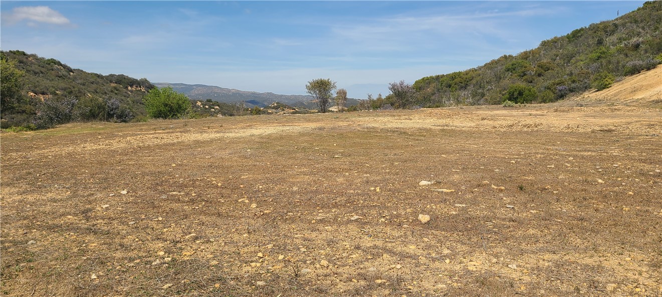 Exceptional opportunity to get started on your custom dream home with a certified pad. Seller has spent approx $150k for permitting, engineering, and grading. Enjoy the serenity of nature from your private slice of paradise with views of the neighboring estates and distant snowcapped mountains. Tucked in the exclusive hills on the Santa Rosa Plateau in an area known as La Cresta. Bring your house plans saving time with a rough grade certification from the County of Riverside, and start living your dream on acreage surrounded by nature! Water, power and phone run underground on Hacienda which is paved and maintained by the HOA. Fire hydrant's installed. Welcome home to La Cresta Highlands tucked in the hills between Orange County and Murrieta: Only minutes to shopping, fine dining and Temecula Wine Country!