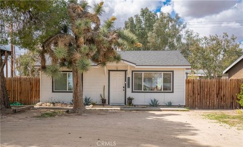 Photo of 6972 Tamarisk Avenue, Yucca Valley, CA 92284 (MLS # JT26003659)