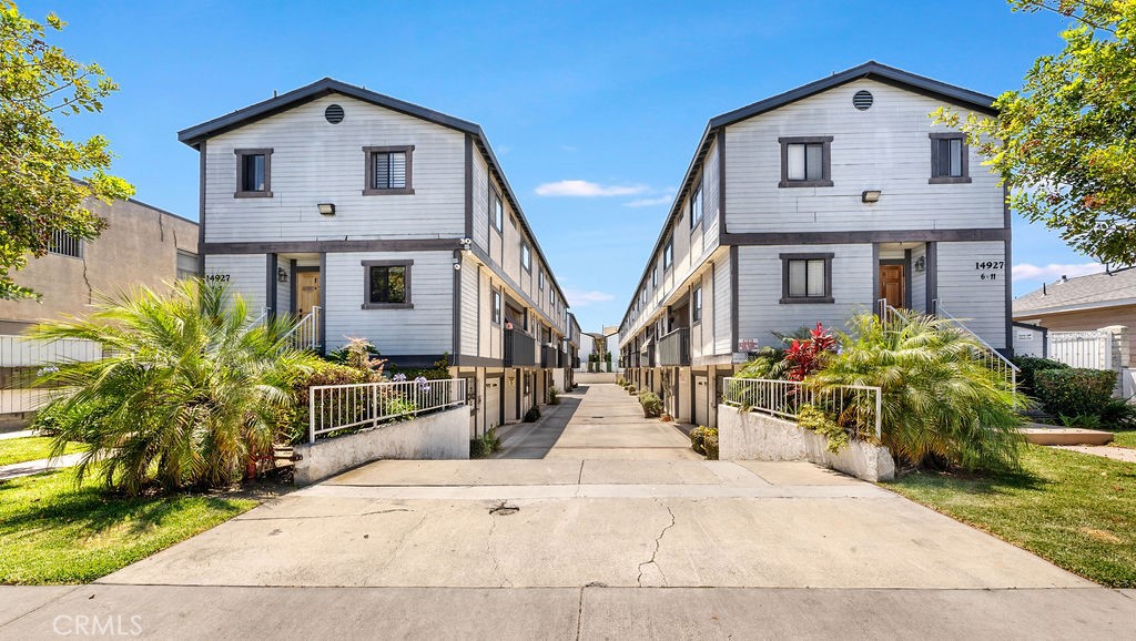 This spacious 3-bedroom, 3-bath tri-level townhome offers 1,531 square feet of potential in a well-maintained HOA community with a private pool and jacuzzi. Step into a bright and open living room with a cozy gas fireplace and sliding doors that lead to a private balcony—perfect for enjoying your morning coffee. The adjacent dining area and kitchen offer generous space, plenty of cabinetry, and a functional layout ready for your creative vision.
Upstairs, the primary suite features its own private balcony, an en-suite bath, and vaulted ceilings that create a sense of space and light. Two additional bedrooms offer flexibility for guests, home office, or family. Additional highlights include in-unit laundry hookups, an attached 2-car garage with direct access, and a second private balcony on the third floor—ideal for relaxing or entertaining. This unit retains much of its original character, giving you a blank canvas to renovate and make it your own. Located close to major freeways, schools, shopping, dining, and just 3 miles from the beach, this is a rare find in Lawndale’s thriving community.
