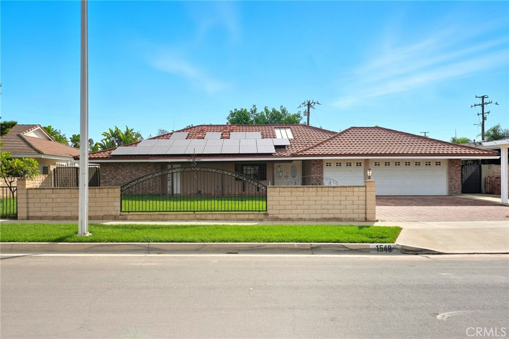 Welcome to this completely refurbished dream home!! Located in the desirable area of North Whittier and the California Country Club, you can't ask for a more sought after neighborhood. This home features 5 bedrooms, 3 baths, 2126 square feet of fully remodeled living space. New paint inside & out, and laminate flooring with a soft cushion throughout, make this home stunning. Granite counter tops & new cabinets in the kitchen, and new stainless steel appliances make it a show stopper. Enjoy the sunny mornings in the sun-room that looks out to the large backyard & rehabbed pool. New recessed lighting is found throughout along with new mirrored closet doors in the bedrooms. Don't miss the chance to own this move-in ready North Whittier gem!!