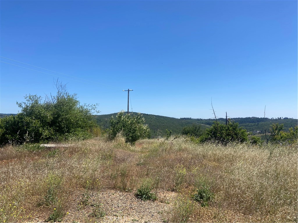 Wow! Private setting with views of the Costal Range. This land can be yours today. All reasonable offers will be considered. Previously located on this lot was a 2 bedroom, 1 bath, 1,365 square feet home built in 1985. Currently this 3.48 acre lot has a power poles, a well but no pump and the condition of the septic is unknown. This location is close to Concow lake as well as Lake Oroville. Don't miss you opportunity to own acreage and the potential of your forever home.