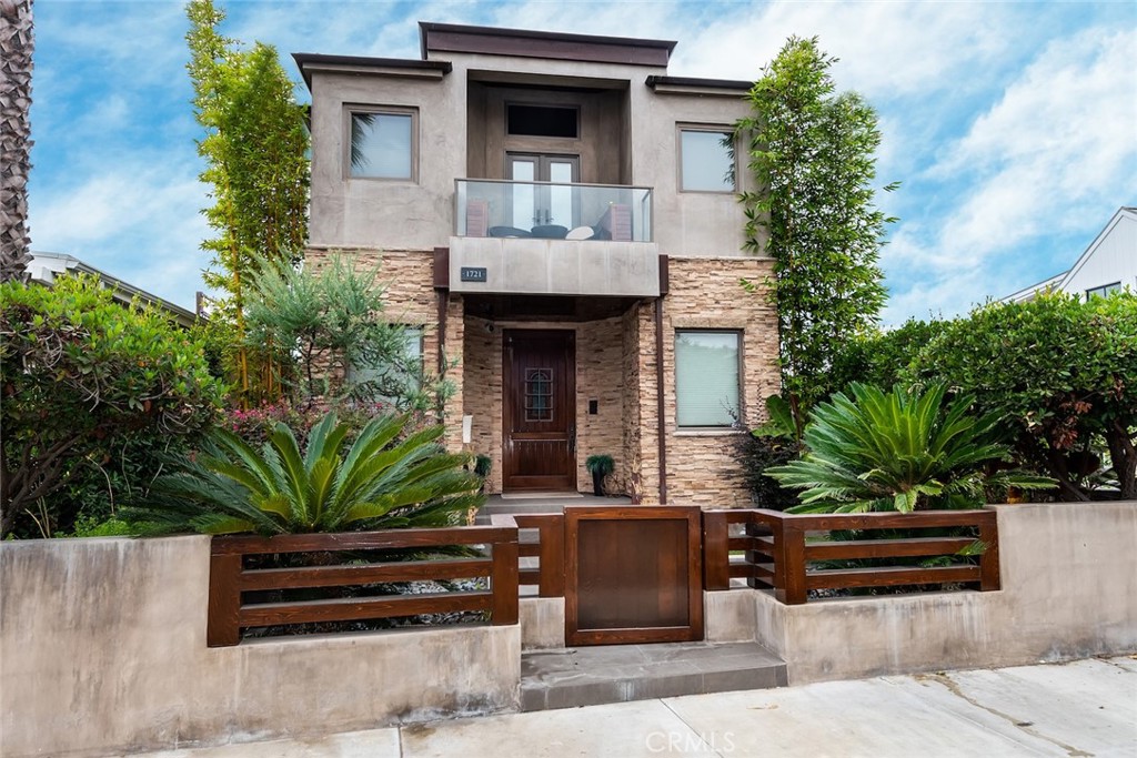 This contemporary, completely custom-built home in the Hermosa Beach Sand Section offers sweeping Palos Verdes to Santa Monica whitewater views. The home is three blocks to the sand and two blocks to Hermosa Pier Avenue with all its restaurants, bars, shops, spas, and nightlife.
The home is offered furnished but has ample, onsite storage should you want to provide some of your own furnishings. Completely unfurnished may be an option for long-term leases with move out and storage fee.
The impressive, four-story executive home has every modern convenience and upgrade imaginable including multiple flat-screen TVs, HD projector screen, high-speed Wi-Fi, a dedicated office, Sonos throughout the home, and a full cinema room. On the top floor the expansive, furnished deck has incredible, 180-degree ocean and sunset views, an outdoor grill and kitchen area, and a 12-person Jacuzzi. The foodie's kitchen is equipped with top-of-the-line, Viking stainless steel appliances, stone and granite counters, a large island, and a walk-in pantry. Multiple gas fireplaces compliment several rooms including the front seating area and master bedroom. The master bedroom has his and hers walk-in closets and a spa-like shower and bath. There are 3 additional en-suite bedrooms, including a second potential master with an elegant, custom, king-sized wall bed, its own balcony, and a large, spa-like bathroom. The lower floor includes a small gym, sauna, steam room, walk-in wine cellar, and 4-car garage and workshop.