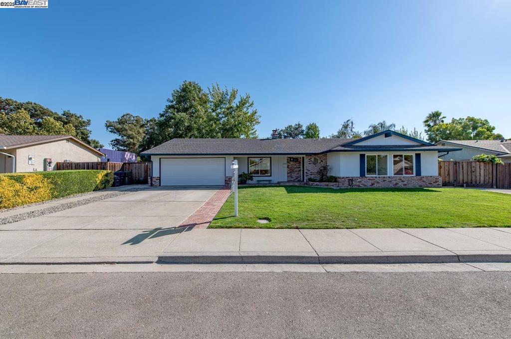 Welcome to this charming residence located at 173 Rainier Avenue, nestled in the desirable Summerset neighborhood of Livermore. This north-facing gem offers a harmonious blend of modern design and smart features that cater to today’s homeowner. Spanning 1,796 square feet, this home boasts 4 bedrooms and 2 newly updated bathrooms, ensuring comfort and style. The expansive 10,000 square foot lot provides ample private outdoor space, perfect for relaxation or entertaining. As you step inside, you are greeted by an inviting living area complete with a cozy fireplace, perfect for those cooler evenings. The oversized kitchen window bathes the room in natural light while preparing meals and enjoy your morning coffee in the versatile bonus sunroom that can be tailored to suit your lifestyle. This home is a perfect blend of functionality and comfort, offering a serene escape in the Summerset neighborhood of Livermore. This unbeatable location sets you minutes from Hwy 84 & Hwy 580, shopping, parks, schools and wineries. Whether you're looking to entertain or find a quiet retreat, this property is ready to welcome you!