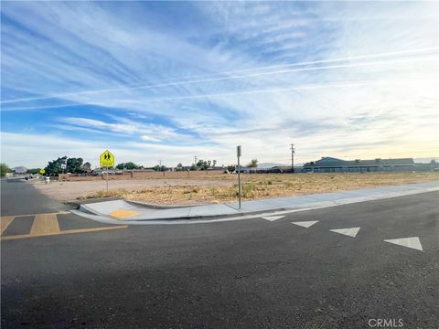 Photo of 0 Rancherias Road, Apple Valley, CA 92308 (MLS # HD26076908)