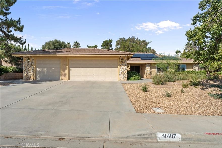 Welcome to this single-story home 2537SQF located on a peaceful cul-de-sac! Featuring 4 spacious bedrooms and 3 bathrooms, bathroom in the primary bedroom newly remodeled. This home offers an open floor plan perfect for entertaining! Step into the cozy family room with a double sided fireplace and enjoy the heart of the home: a kitchen with granite countertops , breakfast bar, induction stove, newer appliances, and newer windows throughout. Stay cool with ceiling fans throughout and enjoy tile flooring for easy maintenance. The backyard is made for gatherings with 2 covered patios and lots of concrete space perfect for BBQs and playtime! The home comes with PAID SOLAR includes electric car charger, 36 panels and 2 back-up batteries, keeping energy bills low. This home has it all — space, style, and savings! Don't miss your chance to own this West Palmdale beauty.