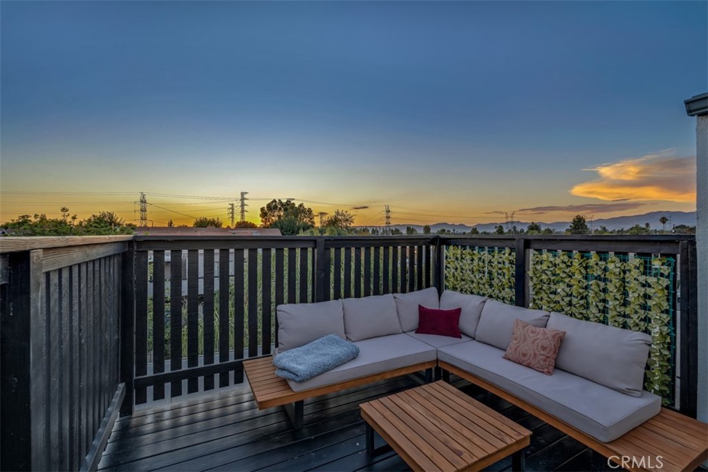 Stunner in Prime Tarzana’s California Place with a Rare Private Rooftop Deck! This gorgeous top-floor, 3-bedroom, 2-bath corner unit boasts soaring cathedral ceilings, exceptional privacy, and an abundance of natural light with beautiful views throughout. It’s like having your own slice of Europe right here in the Valley! Step inside to an open-concept living area, where expansive windows fill the space with sunlight. Sprawling living area with access to the balcony and an accent fireplace that serves as the focal point. The galley-style kitchen flows seamlessly to your al fresco balcony—the perfect spot for your morning coffee or evening unwind. The main level features two spacious bedrooms and a full bath, while the upstairs loft offers a third bedroom and bath—ideal for guests, a home office, or your own private retreat. From the loft, step out onto your private rooftop deck and soak in the magic of the evening sky. Additional highlights include abundant storage with multiple closets, a newer electrical panel, stainless steel stove, fresh interior paint, updated bathroom sinks (Moen and Delta faucets), and a fully remodeled upstairs bath featuring an expanded shower and elegant tile finishes. This home comes with two parking spaces plus extra storage. Easy access to the unit with an entrance off of Yolanda. The HOA covers water and gas, while the lush, resort-style grounds make every day feel like a getaway—complete with a sparkling pool, spa, BBQ area, and remodeled clubhouse featuring a lounge, fireplace, kitchen, and pool table. Ideally located near some of Tarzana’s best shopping, dining, entertainment, and parks, with easy access to the G Line Bike Path and the 101 Freeway.