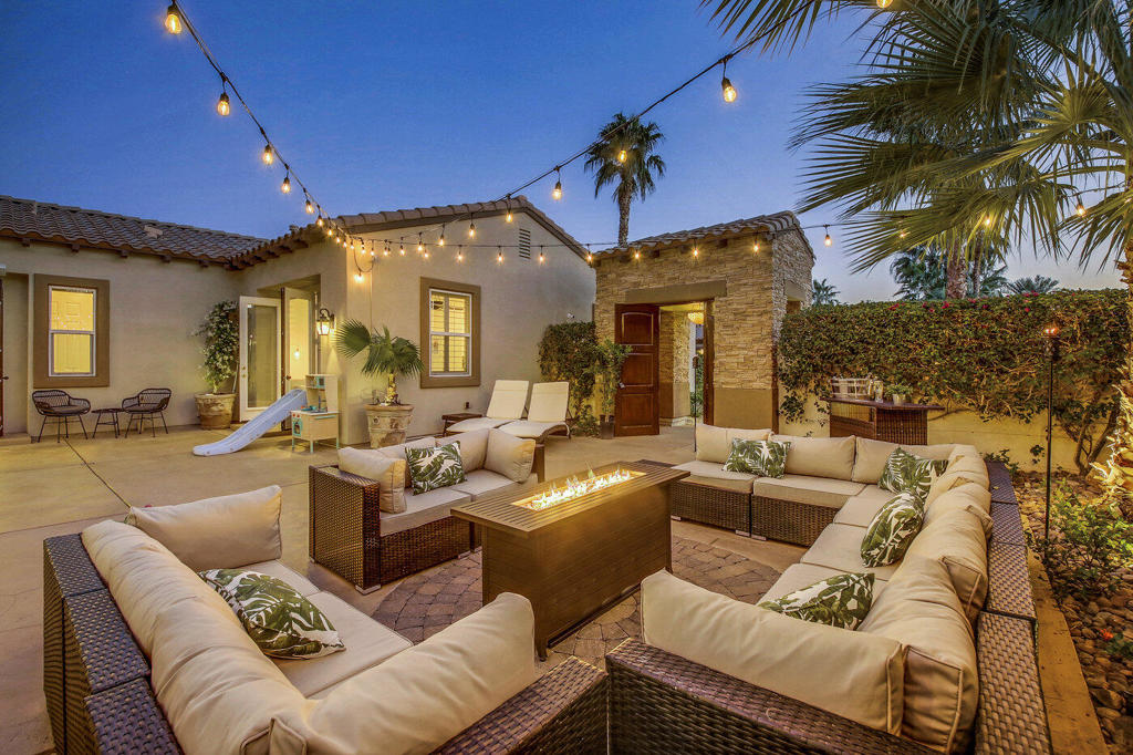 ***Available again April 2026 onwards*** Newly renovated, this stunning property overlooks the 17th green of renowned PGA West Nicklaus Tournament golf course. This home features 5 bedrooms, 3 bedrooms in the main house plus the detached 2 room casita boasts it's own private bathroom. Enjoy our desert nights with indoor/outdoor resort living. Glass wall sliders open to salt water pool (brand new child safety gate available for use), BBQ, outdoor games and mister system. This highly coveted Quevedo Plan offers many amenities including a gourmet granite island kitchen with stainless steel appliances, game room with pool table and wet bar area. TV's in every bedroom, private enclosed courtyard for desert nights by the fire. The master bedroom suite features a dual sided fireplace to the bedroom and the master bath (with soaker tub and large walk in closet). Located in close proximity to Ernie's Restaurant. Owner prefers a three month minimum-inquire for exceptions. Pets by application. Rate includes HOA dues, $200 utility allowance per month, 24 hour patrolled gated security, landscape and pool maintenance. Rates vary by month 2025/26: Nov-Mar $15K, April $16K, May $13K, June $9K, July-Sept $7K, Oct 12K,. Deposit equal to one month's rent. Pets by application.