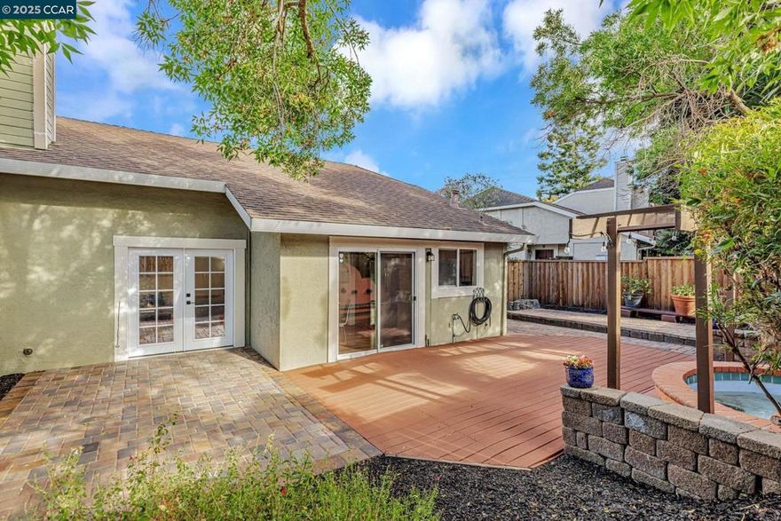 Exquisitely ONE STORY upgraded 3BD/2BA home in the prestigious Arbor Creek community. Soaring vaulted ceilings, premium laminate flooring, freshly painted, plantation shutters, fireplace create an elegant ambiance. Chef’s kitchen with granite countertops and stainless steel appliances. Luxurious primary suite with upgraded vanity with attached patio. More upgrades include new double-pane windows, doors & attic insulation.  Outdoor spaces shine with a lush artificial-turf front yard and a private backyard oasis featuring an upgraded deck, pavers, and a tranquil fountain. Detached 2-car garage with epoxy floor. Low HOA with resort-style pool, spa, and greenbelt access. Close to fine dining, shopping, BART, Tesla hub, I-580/680, and top-rated Dublin schools.