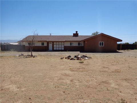 Photo of 19993 Rimrock Rd, Apple Valley, CA 92307 (MLS # CV25270827)