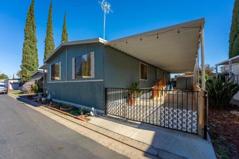 Photo of 250 E Las Palmas Avenue #80, Patterson, CA 95363 (MLS # ML82065429)