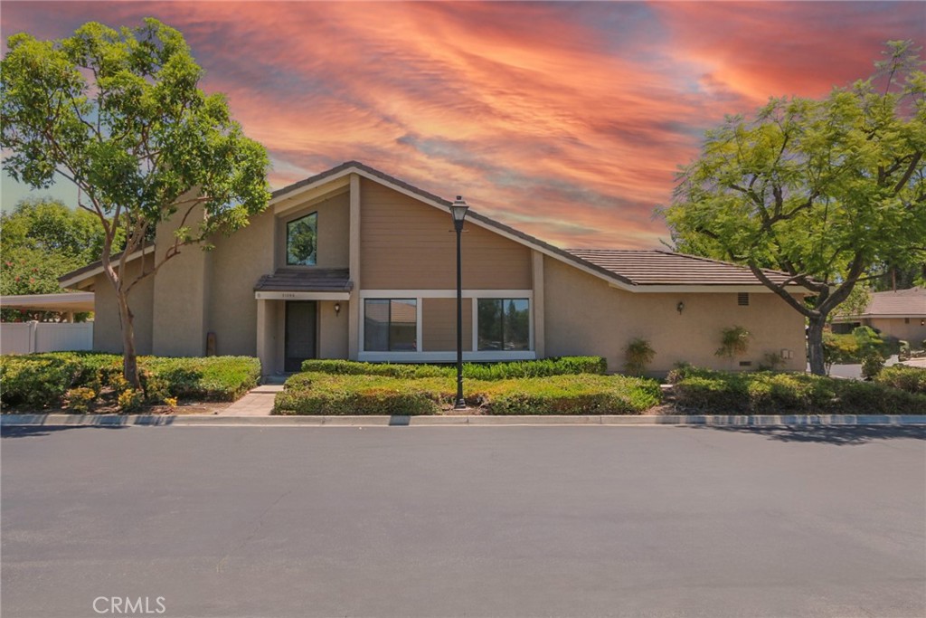 Nestled in the Quiet, Tranquil, Meadowood Community in Yorba Linda, live like You are on Vacation Every Day!!! This Corner Unit, 3 Bedroom, 2 Bathroom Home is the One You have been waiting for! Upon Entry, You are Welcomed with Vaulted Ceilings and an Open Floorplan. The Large Patio is accessed off of the Living and Dinning Room(s) and allows for extended living and dining space, under the shady pergola! The 1st bedroom at the front of the Home, allows for a flex space as an office, kids play area, extended living space, or of course, a cozy bedroom! The 2nd Bedroom has a built in closet organizer with a large window to enjoy the Sunlight and Beautiful Meadowood Grounds! The Large Primary Bedroom and Bathroom Features; a walk-in closet, vaulted ceilings, dual sinks with ample counter space, and a private patio perfect for reading and relaxing! For Your Convenience, there is inside laundry steps away from all 3 bedrooms. The Attached, 2 car garage is spacious and allows for extra storage and a workbench area. Other Highlights include; oversized tile flooring, freshly pained interior, all new baseboards, new ceiling fans in every room, and new carpet in each bedroom. The Placentia-Yorba Linda Unified School District showcases Award Winning Schools for the Young Loved Ones in Your Life! Located minutes away from; freeways, endless shopping and dining, walking and horse trails, parks, and golf courses, make 21395 Via Del Lobo in Picturesque Yorba Linda, Your Forever Home!!!