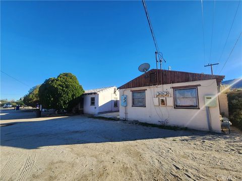 Photo of 6444 Tamarisk, 29 Palms, CA 92277 (MLS # JT25268511)